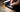 Inserting SIM card into dual SIM flip phone tray