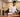 Filtered kosher phones from the 2026 TAG kosher phone list arranged on a wooden desk at a TAG office workstation