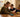 Mother and young son reviewing a simple flip phone at the kitchen table — choosing a first phone for kids