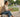 Person sitting on a porch holding a simple flip phone after switching from a smartphone to a kosher phone